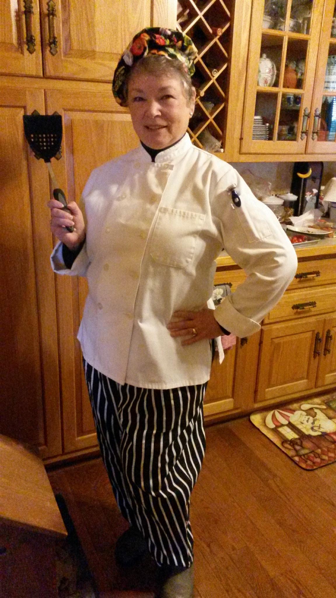 Kat Sturtz in chef's uniform